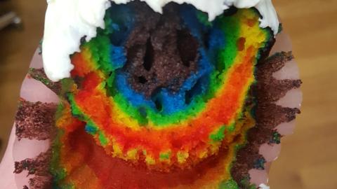 Rainbow colored cupcake