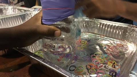 Sampler made from a plastic cup and rubber glove