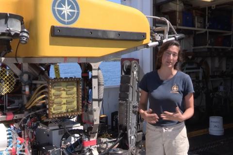 woman standing in front of ROV