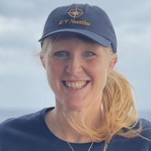 Lisa Ball standing on deck of Nautilus