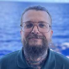 Ashton Flinders at-sea headshot