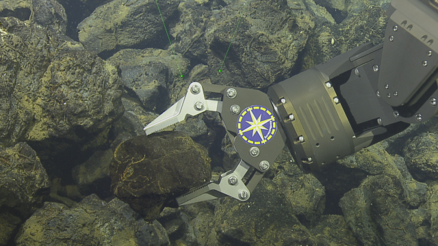 Collecting geologic samples helps us understand the composition of the lavas erupted at Toto Seamount and learn more about its history.