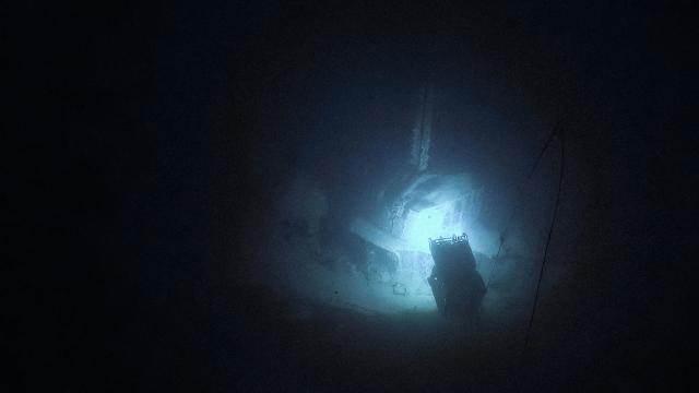 Fittingly, the ship was found with forward gun turrets pointed skyward, matching the ship’s design for anti-aircraft protection of larger ships. This view of ROV Hercules exploring the wreck was taken from ROV Atalanata.