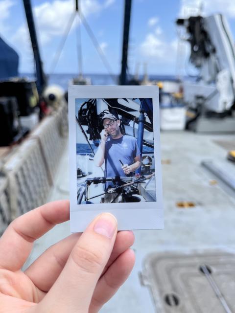 A man holds a cable towards the back of Nautilus