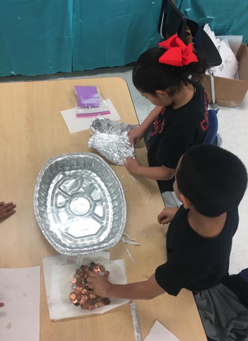 JFK Elementary 1st graders excelled at the Nautilus penny boat buoyancy challenge