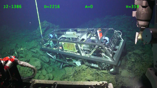 ROV <em>Argus</em> seen resting on the seafloor below ROV <em>Hercules</em>