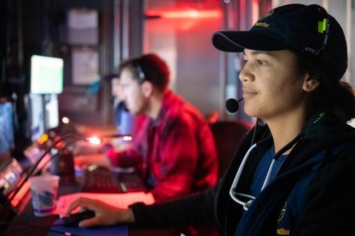 Science Communication Fellow looks at computer screen