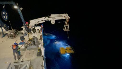 ROV Hercules launching at night off of Nautilus