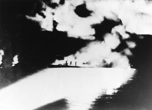 USS Quincy (CA-39) photographed from a Japanese cruiser during the Battle of Savo Island, off Guadalcanal