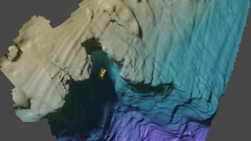 Three-dimensional rendering of bathymetry from the Norbit multibeam visualized with a model of ROV Hercules as it explores a vertical wall. All data is represented as a 3d occupancy grid with meshes as a final product - allowing for the preservation of detail in vertical structure versus traditional gridding methods. 